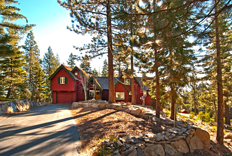 Luxury home in Lake Tahoe. Driveway leading to home in the forest.